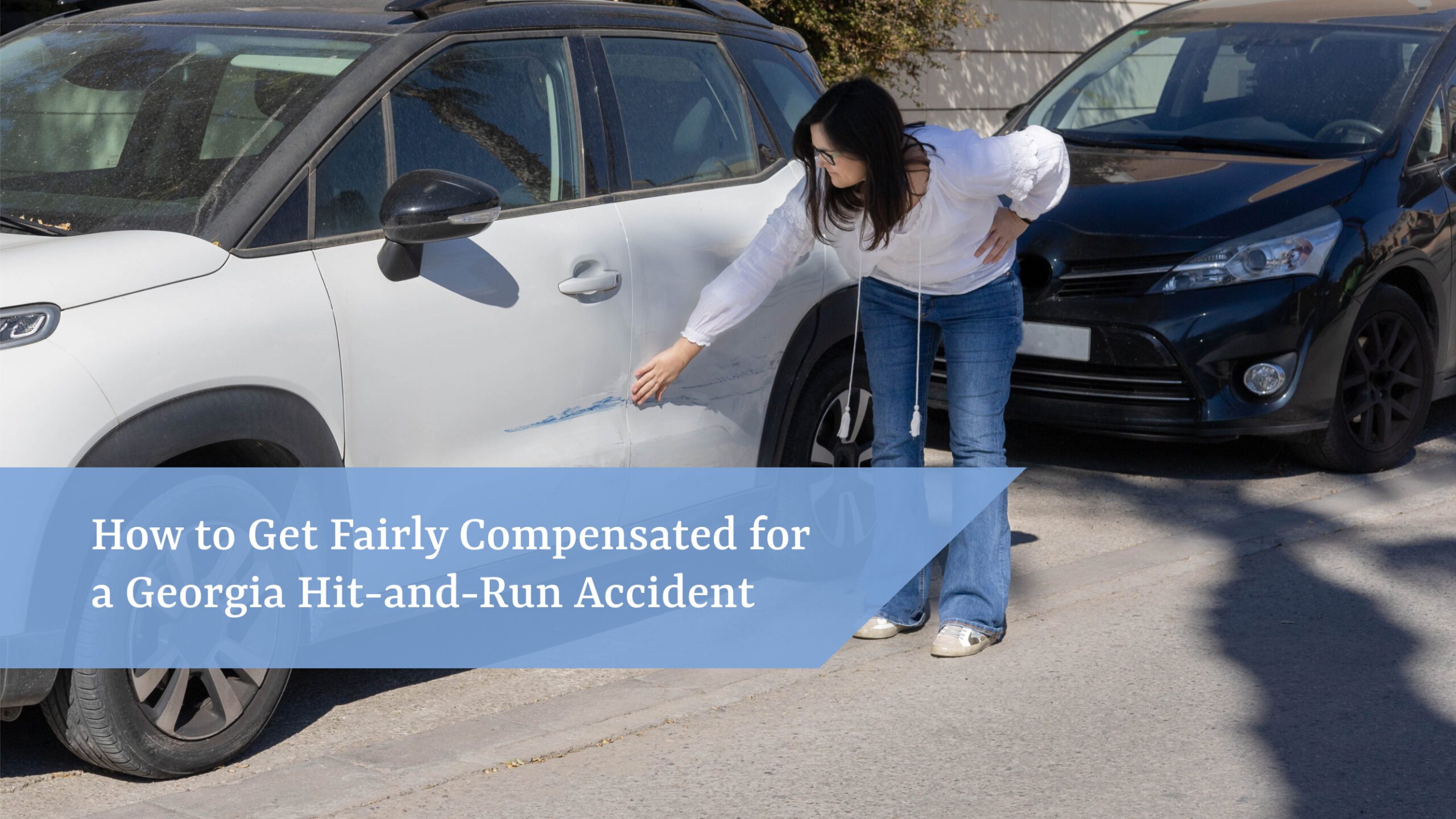 Damaged car on the side of the road after a hit-and-run accident